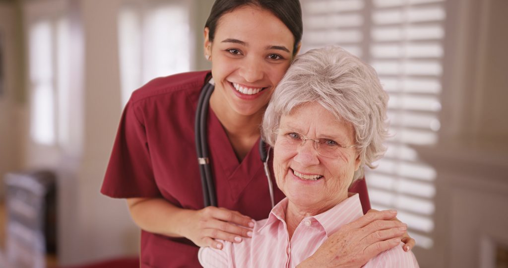 Home care worker with senior aged woman